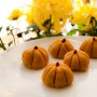 Pumpkin mochi balls with black sesame and red bean paste