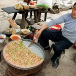 Taro cake seller in Rongjiang